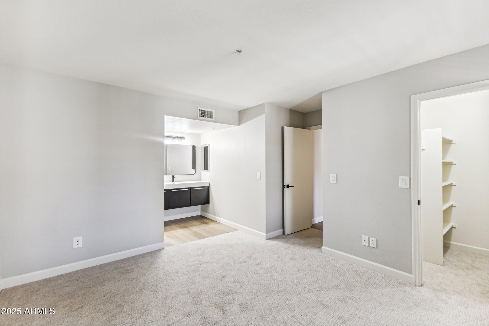 10610 South 48th Street, Unit 2016 Phoenix, AZ 85044 - Photo 7 of 13 a view of a big room with a kitchen