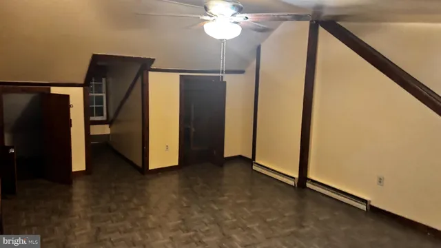 a view of a hallway with closet