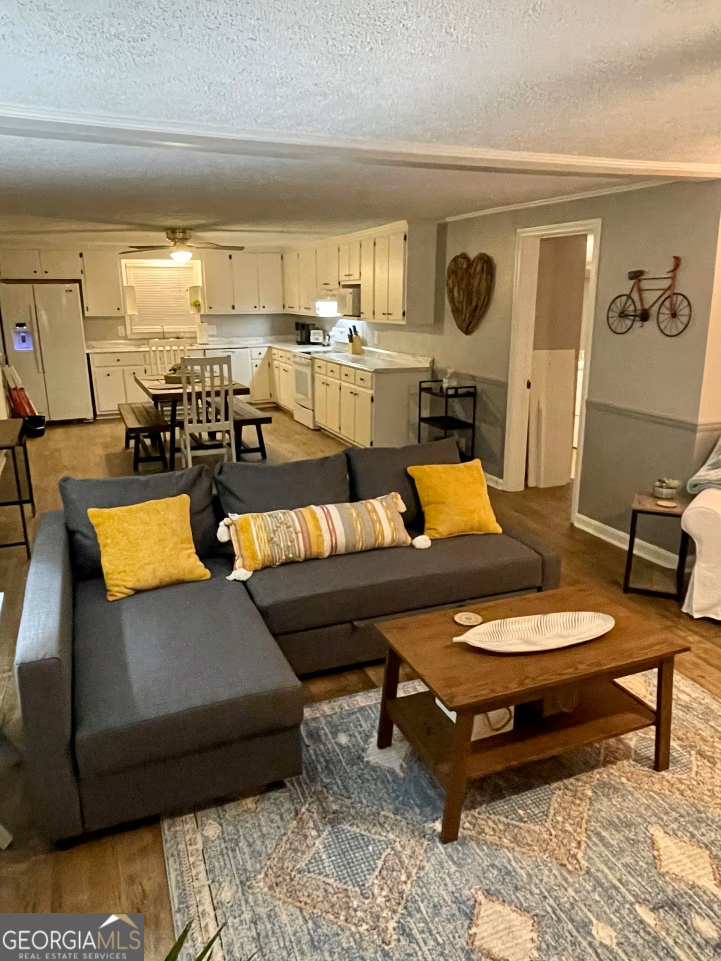 973 Barker Road Southwest Rome, GA 30165 - Photo 13 of 39 a living room with furniture and wooden floor