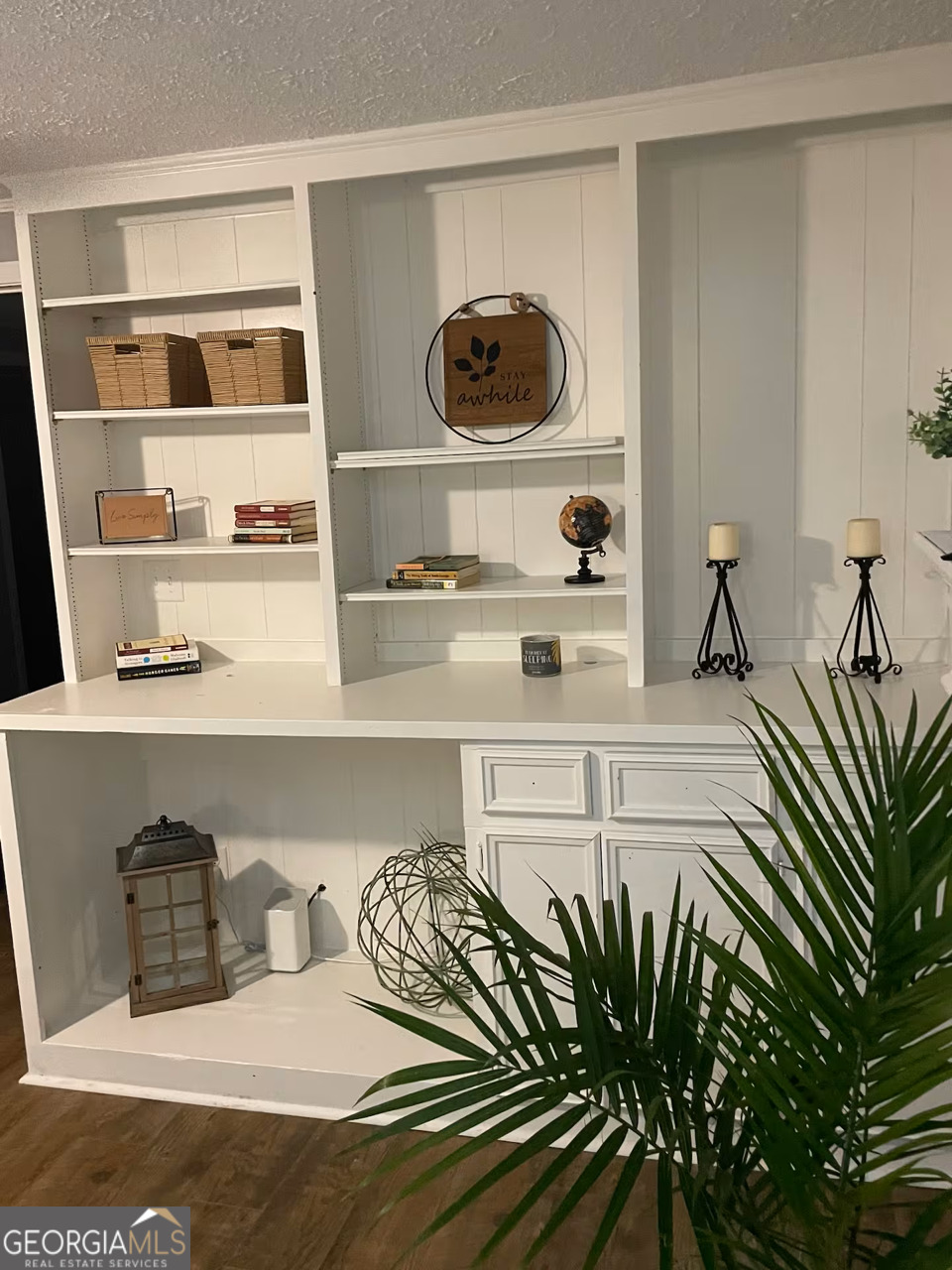 973 Barker Road Southwest Rome, GA 30165 - Photo 21 of 39 a bedroom with a bed and cabinets