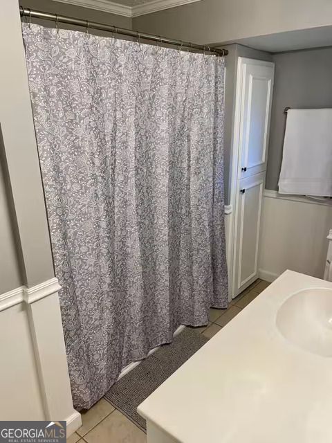 973 Barker Road Southwest Rome, GA 30165 - Photo 26 of 39 a bedroom with a bed and a mirror