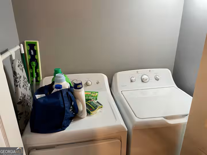 973 Barker Road Southwest Rome, GA 30165 - Photo 33 of 39 a utility room with dryer and washer