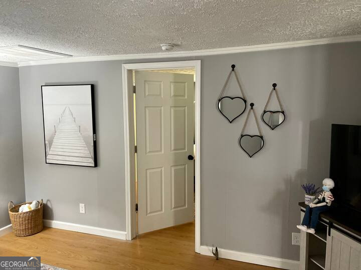 973 Barker Road Southwest Rome, GA 30165 - Photo 34 of 39 a view of a room with rack on the wall