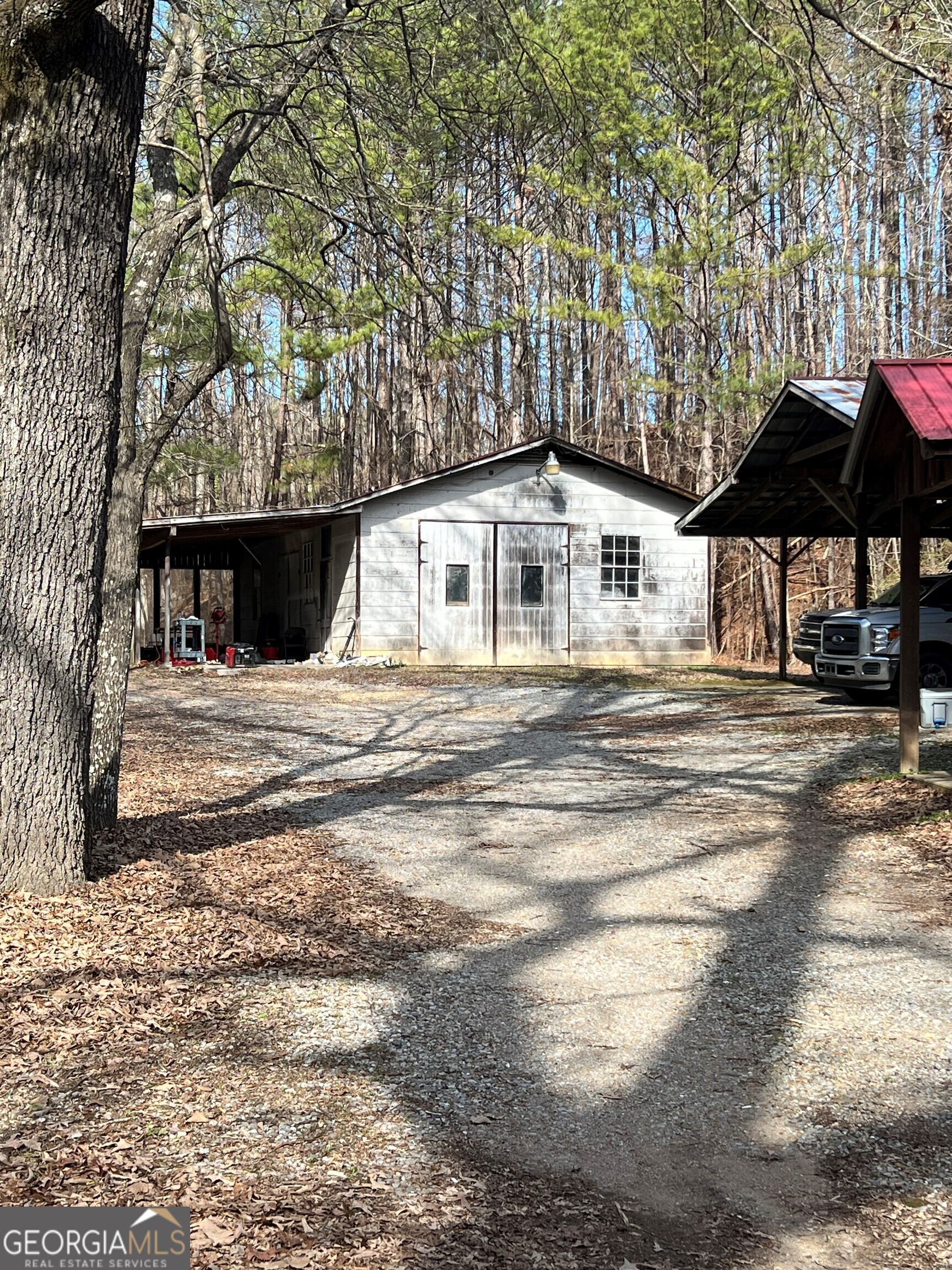 973 Barker Road Southwest Rome, GA 30165 - Photo 8 of 39 a view of a house with a snow