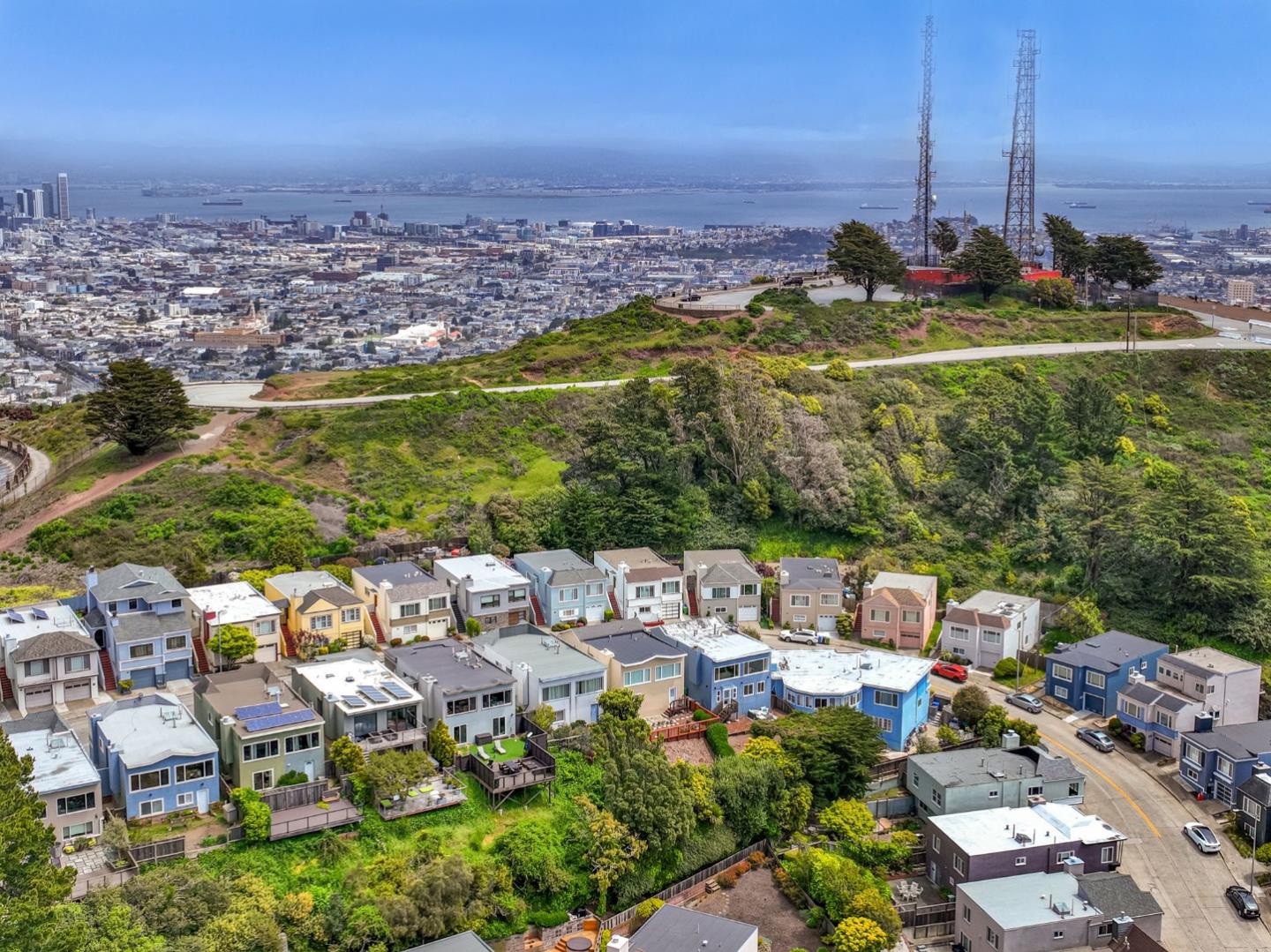 a view of a city with lawn chairs