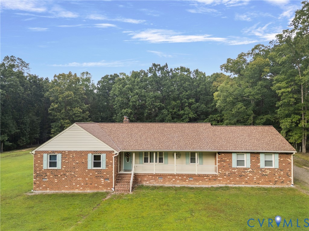 15300 Gamecock Road Midlothian, VA 23112 - Photo 1 of 1 Single story home with covered porch, a front yard