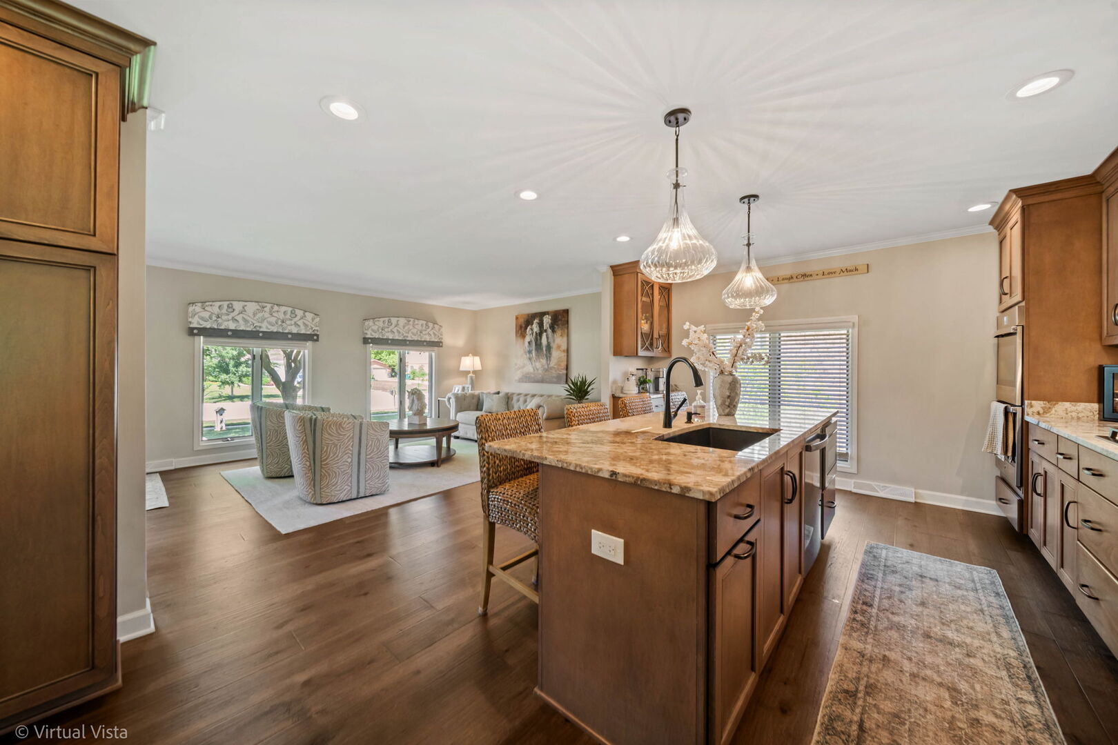506 South Raven Road Shorewood, IL 60404 - Photo 14 of 37 a view of a kitchen counter space wooden floor electric appliances and windows
