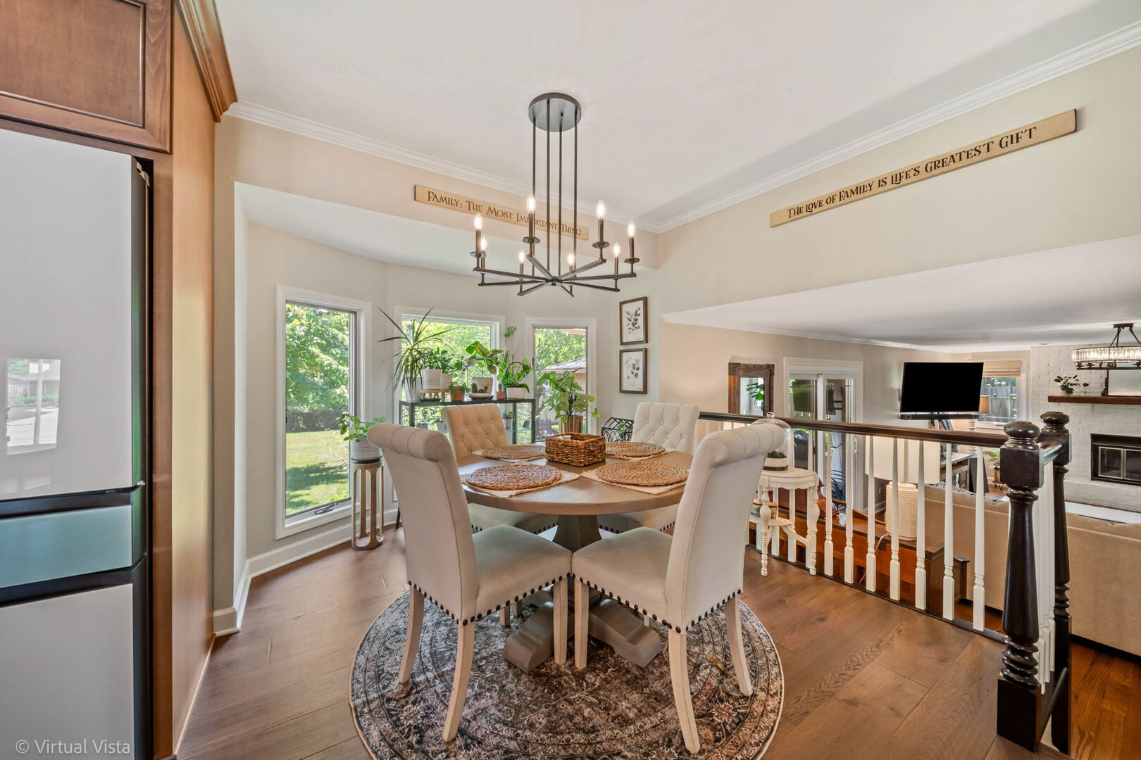 506 South Raven Road Shorewood, IL 60404 - Photo 15 of 37 a view of a dining room with furniture window and wooden floor