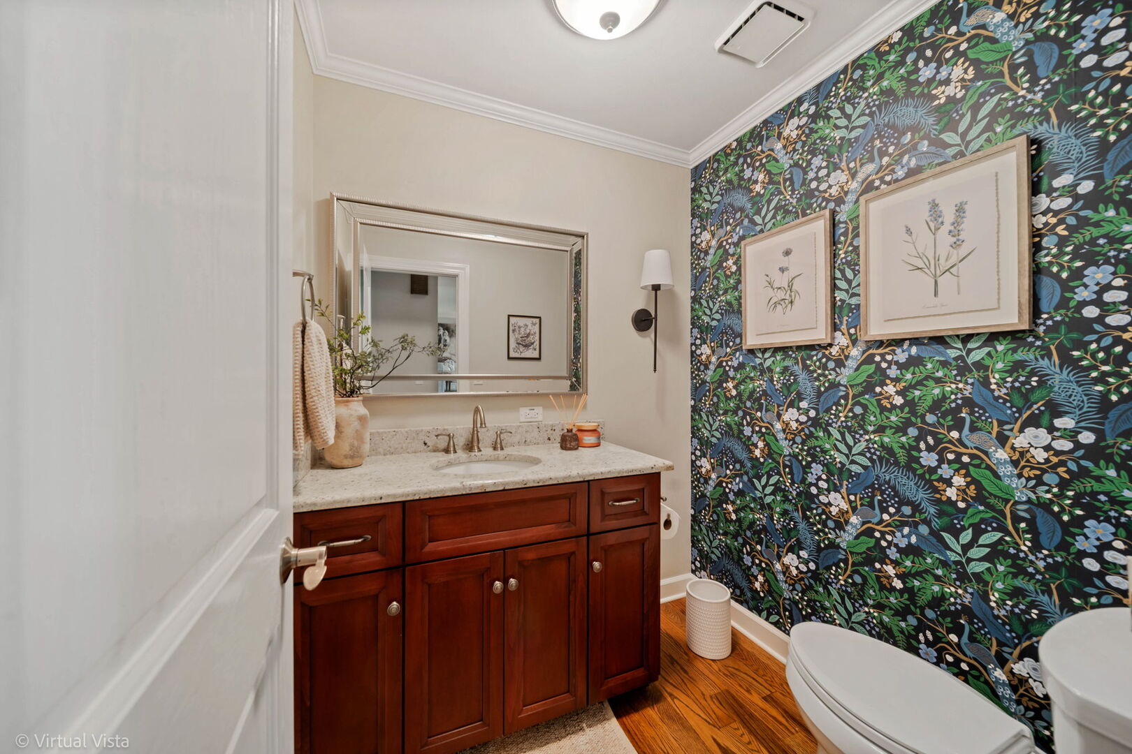 506 South Raven Road Shorewood, IL 60404 - Photo 20 of 37 a bathroom with a toilet sink and mirror
