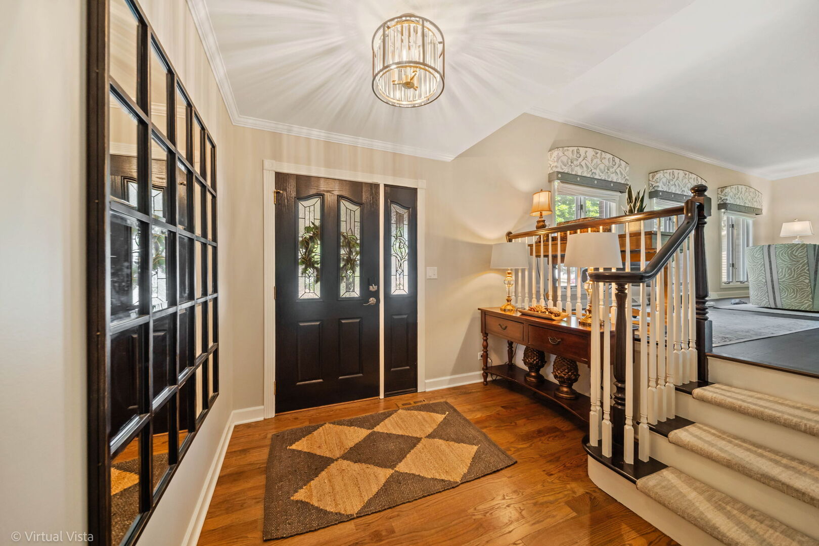 506 South Raven Road Shorewood, IL 60404 - Photo 3 of 37 a view of entryway with wooden floor