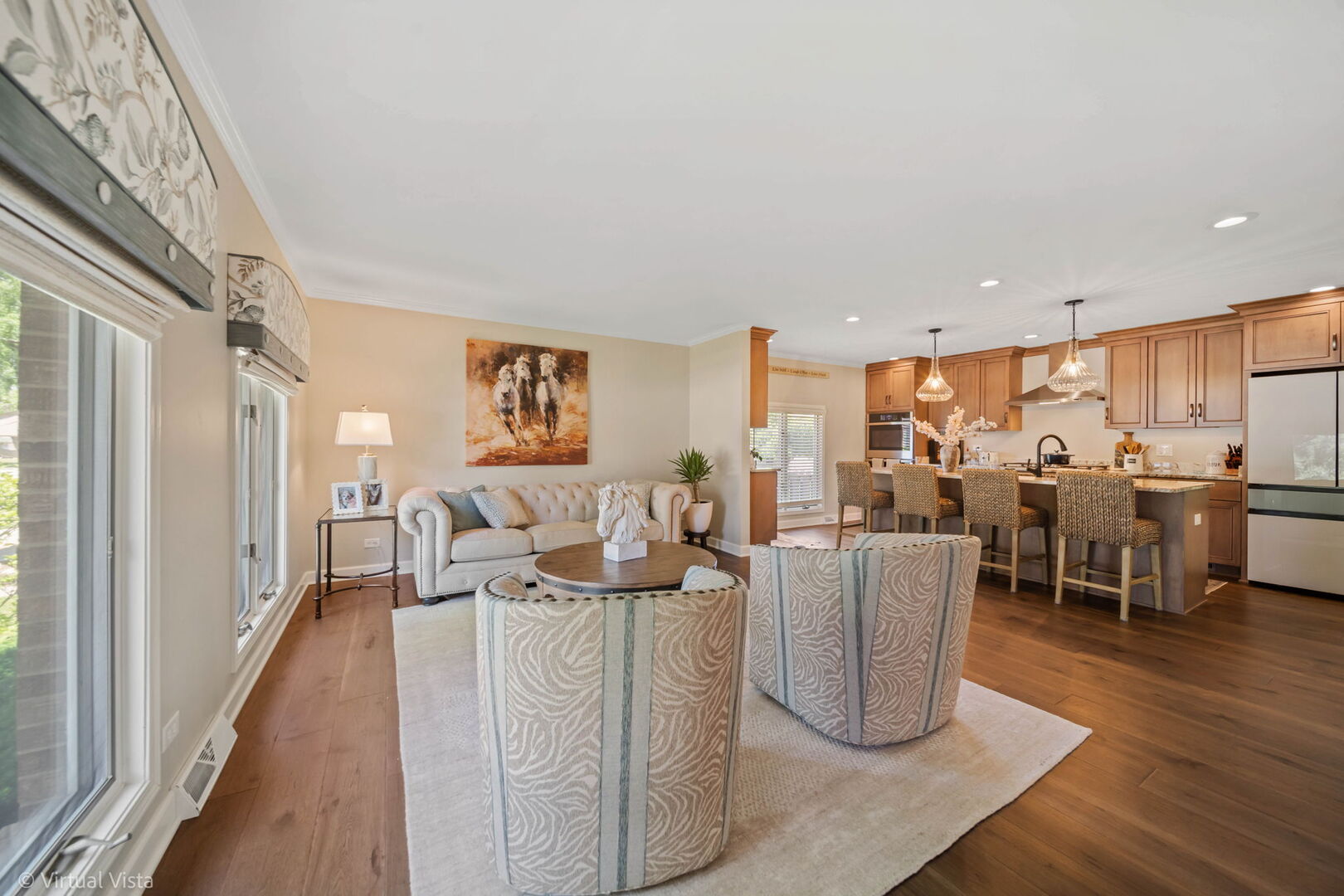 506 South Raven Road Shorewood, IL 60404 - Photo 6 of 37 a living room with lots of furniture and a kitchen view
