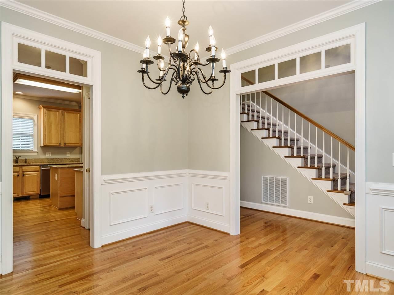 4408 Thistlehill Court Raleigh, NC 27616 - Photo 5 of 25 a view interior of a house with wooden floor windows and kitchen view