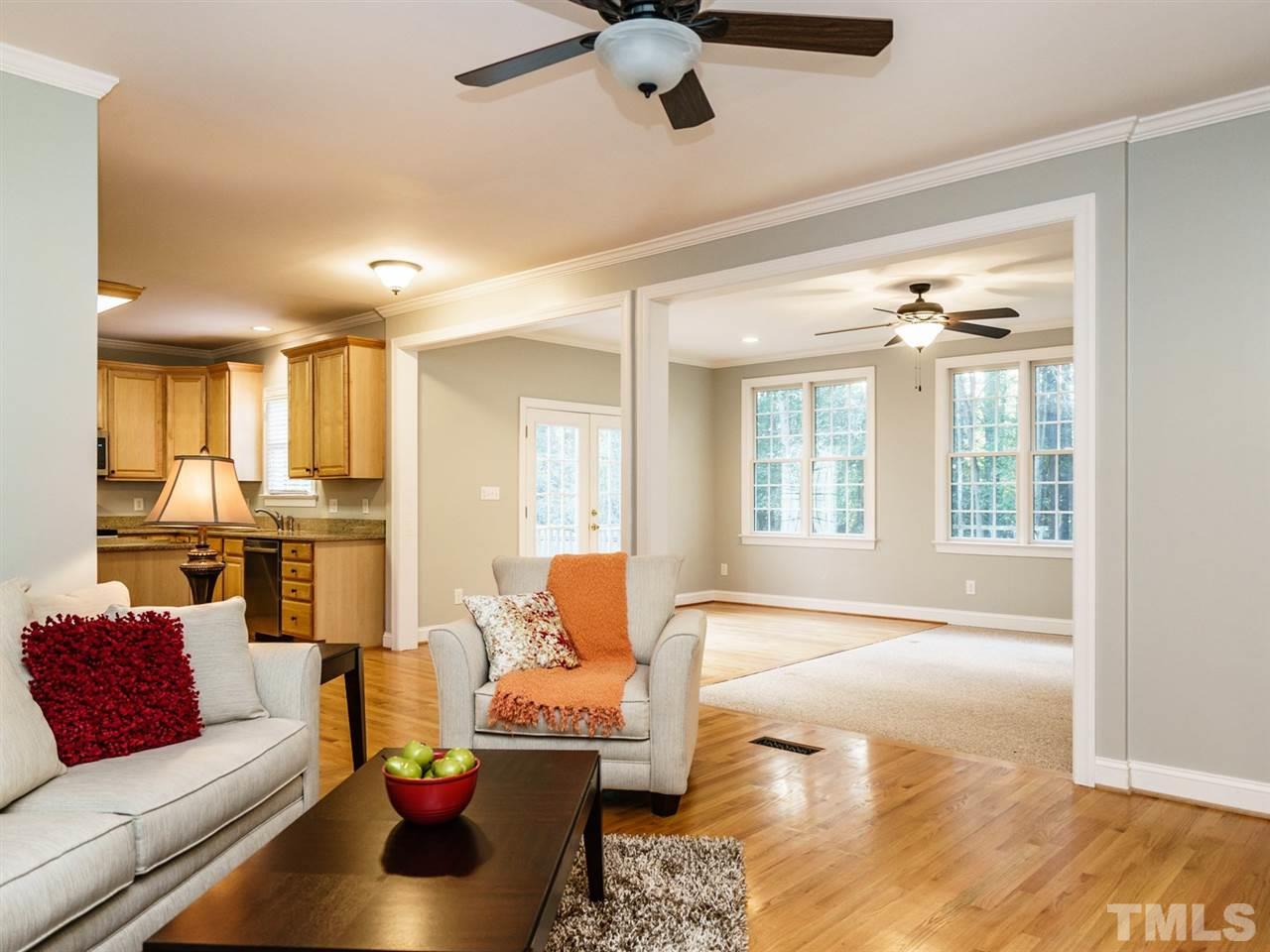 4408 Thistlehill Court Raleigh, NC 27616 - Photo 25 of 25 a living room with furniture and a large window