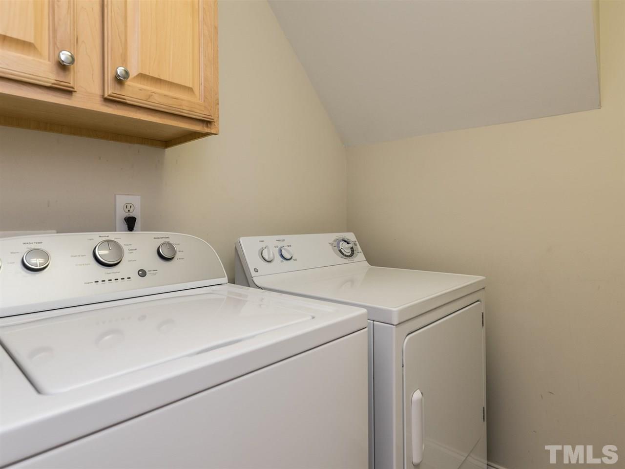 4408 Thistlehill Court Raleigh, NC 27616 - Photo 9 of 25 a utility room with dryer and washer