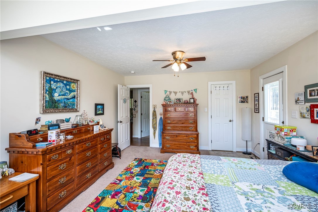 4275 Rockhill Road Mechanicsville, VA 23111 - Photo 15 of 43 a bed room with a bed and a dresser