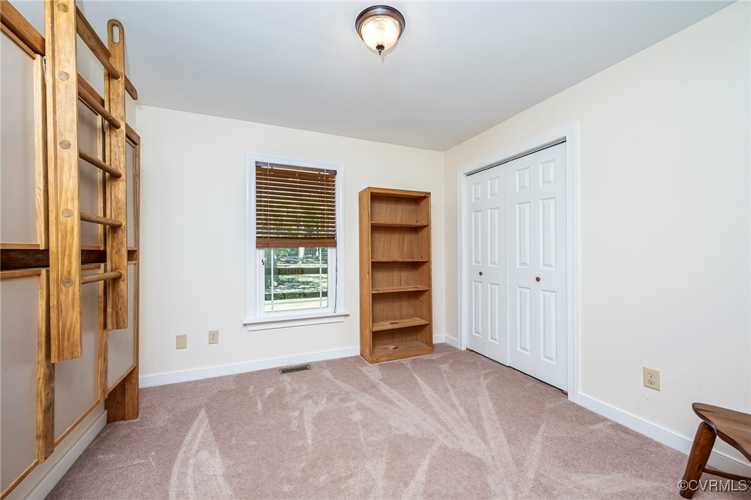 4275 Rockhill Road Mechanicsville, VA 23111 - Photo 28 of 43 a view of an empty room with a window and closet