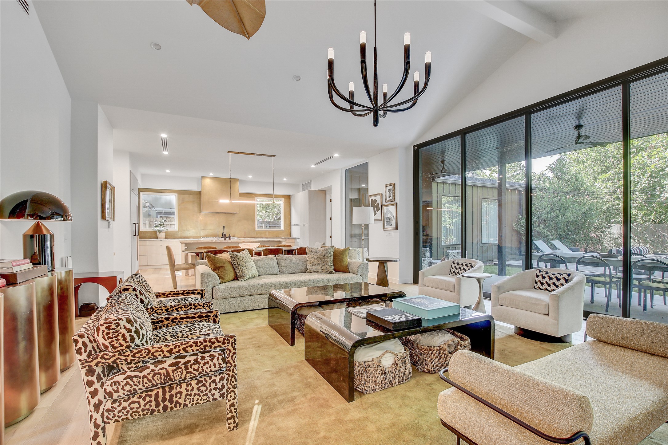 2006 Ford Street Austin, TX 78704 - Photo 6 of 40 Living room with beamed ceiling, a chandelier, and high vaulted ceiling