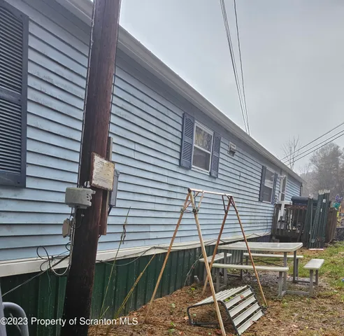 a view of a dinning tables and chairs in patio