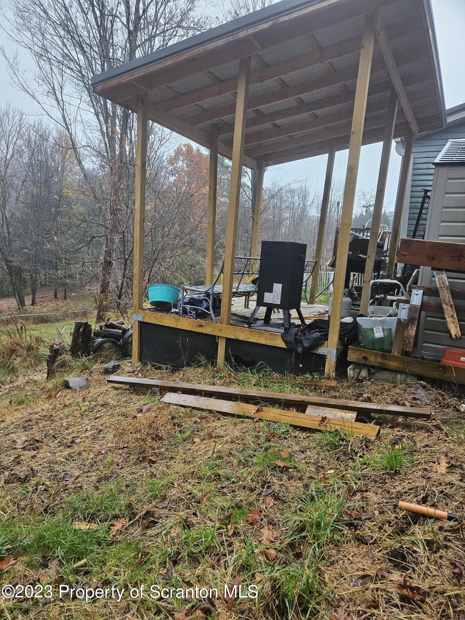 1262 Demunds Road Dallas, PA 18612 - Photo 10 of 15 a view of swimming pool with outdoor seating