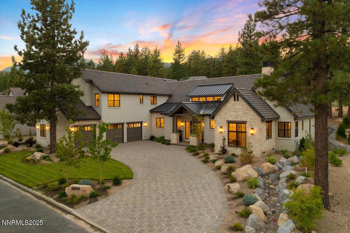 front view of a house with a yard