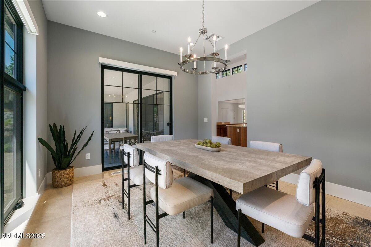 20555 Latour Way Reno, NV 89511 - Photo 18 of 59 a view of a dining room with furniture window and wooden floor