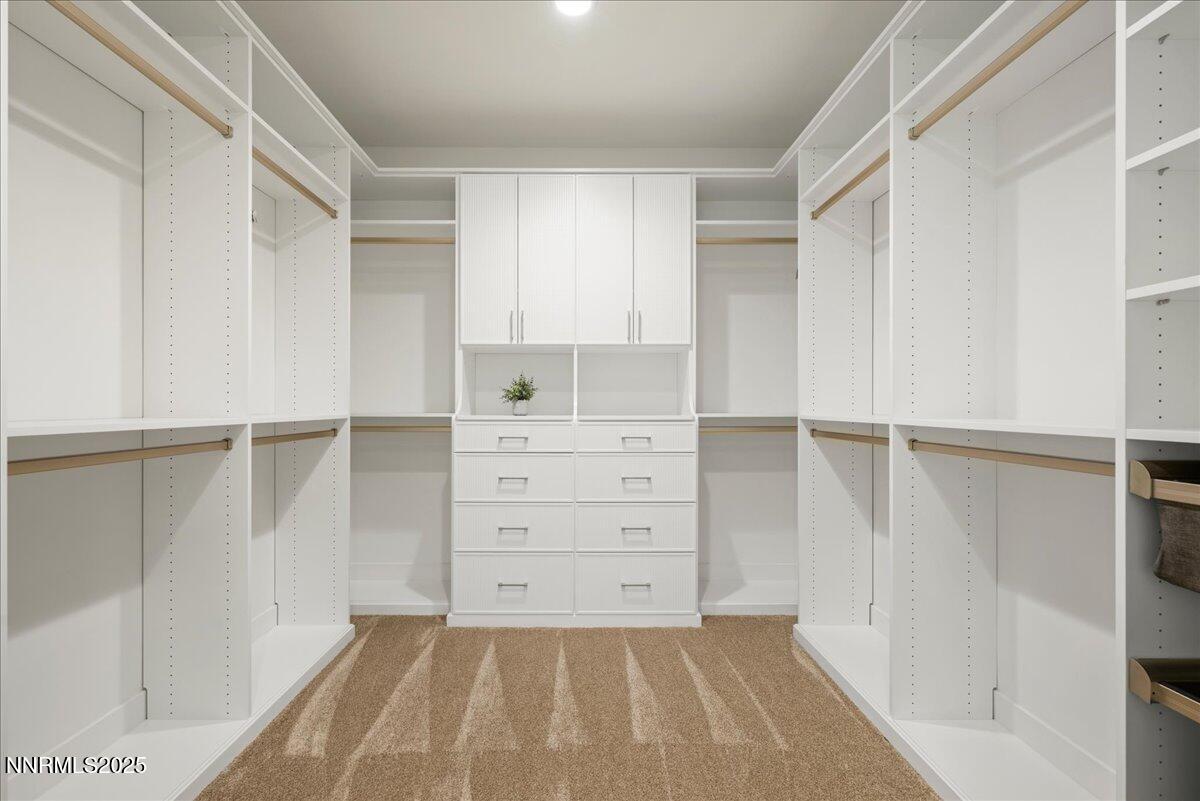 20555 Latour Way Reno, NV 89511 - Photo 23 of 59 a view of walk in closet with empty racks