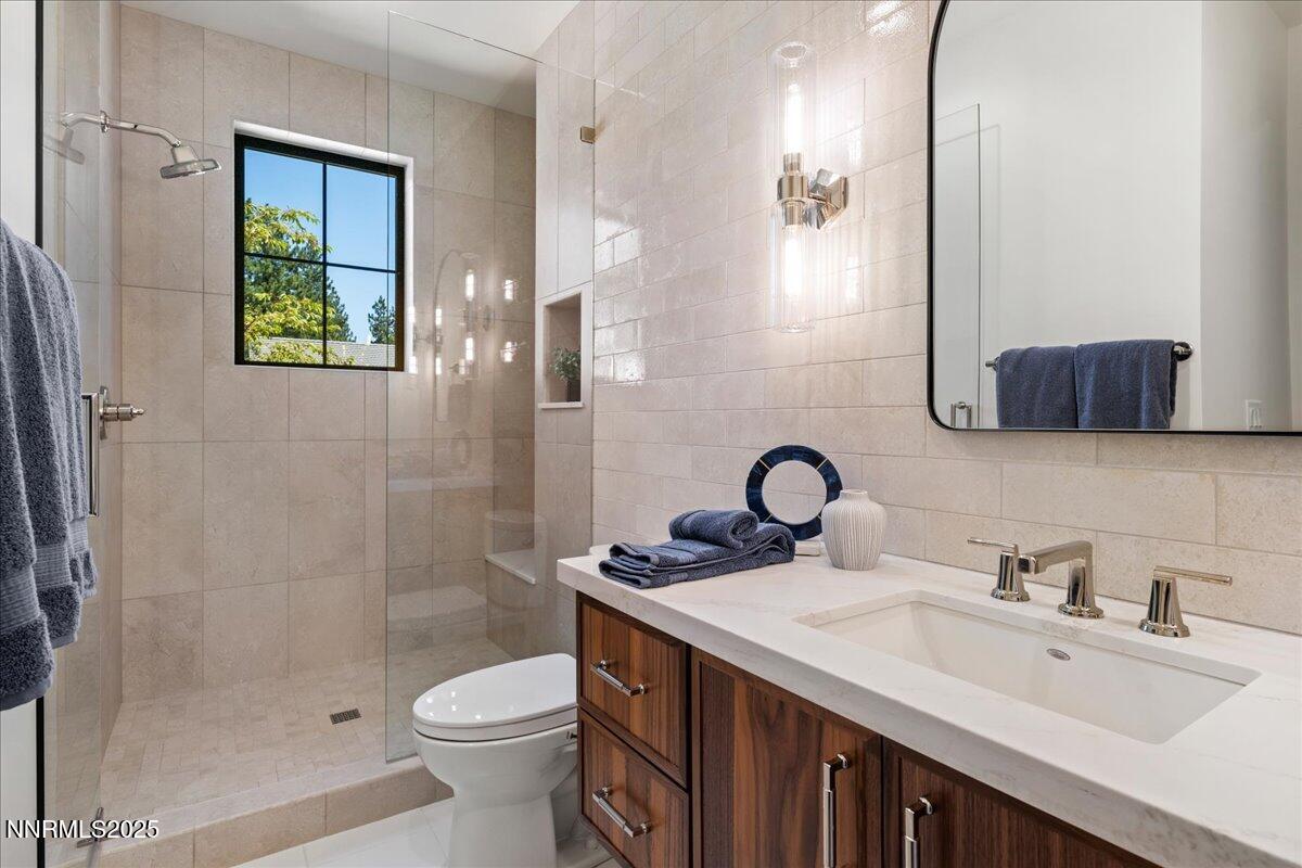 20555 Latour Way Reno, NV 89511 - Photo 34 of 59 a bathroom with a sink a toilet and shower