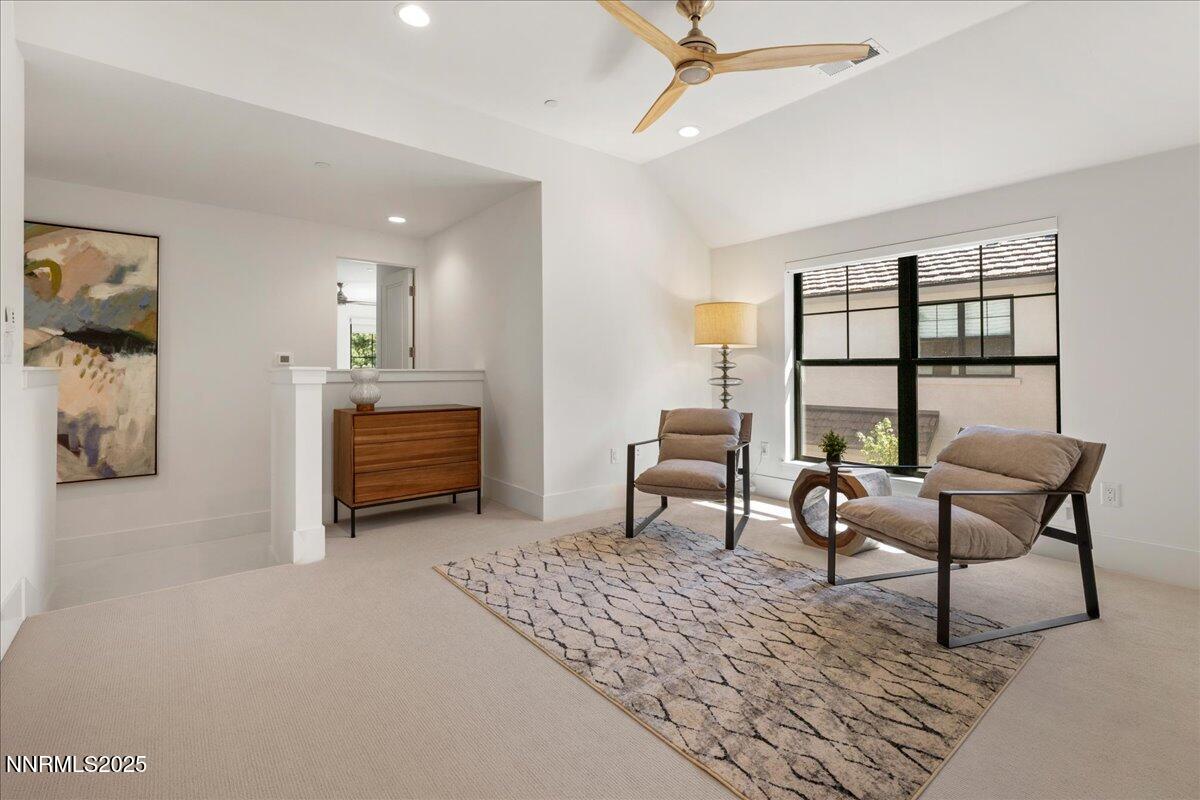 20555 Latour Way Reno, NV 89511 - Photo 36 of 59 a bedroom with furniture and a rug