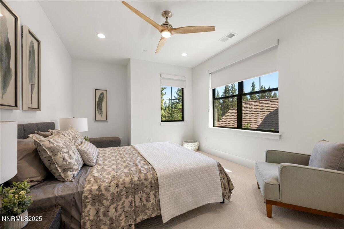 20555 Latour Way Reno, NV 89511 - Photo 44 of 59 a bedroom with a bed couch and window