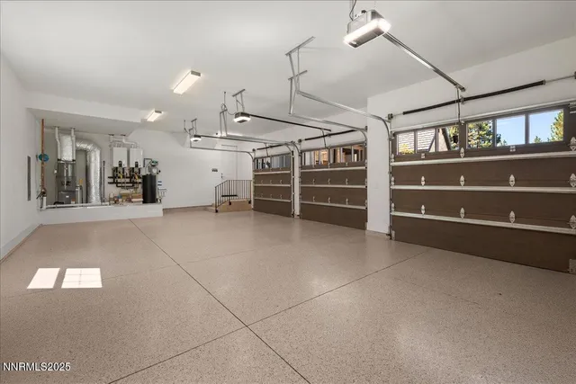 a view of a patio with dining table and chairs with plants and trees