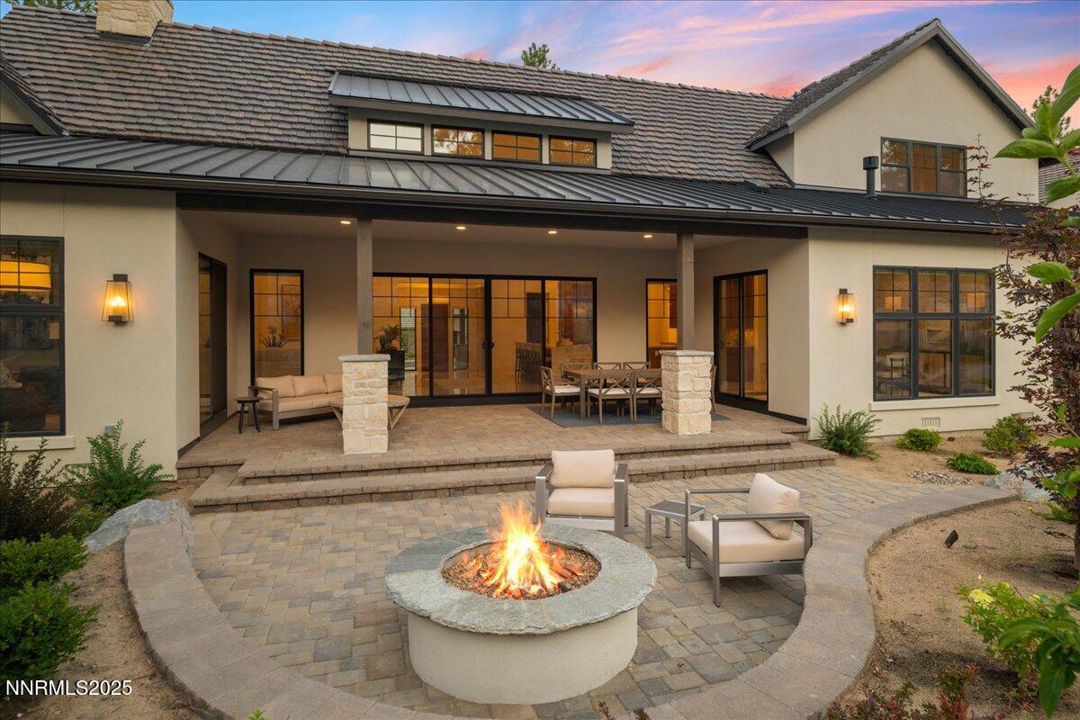 20555 Latour Way Reno, NV 89511 - Photo 53 of 59 a view of a patio with dining table and chairs