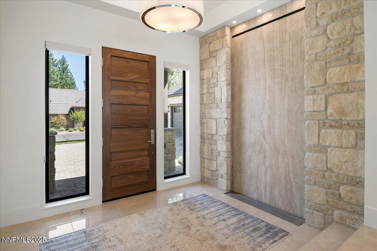 20555 Latour Way Reno, NV 89511 - Photo 6 of 59 a view of front door and bedroom of a house