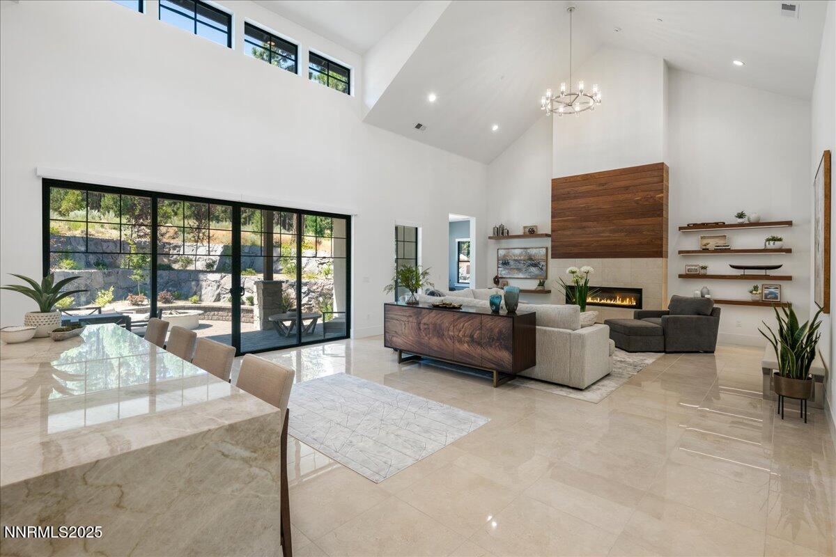 20555 Latour Way Reno, NV 89511 - Photo 10 of 59 a living room with furniture and a flat screen tv