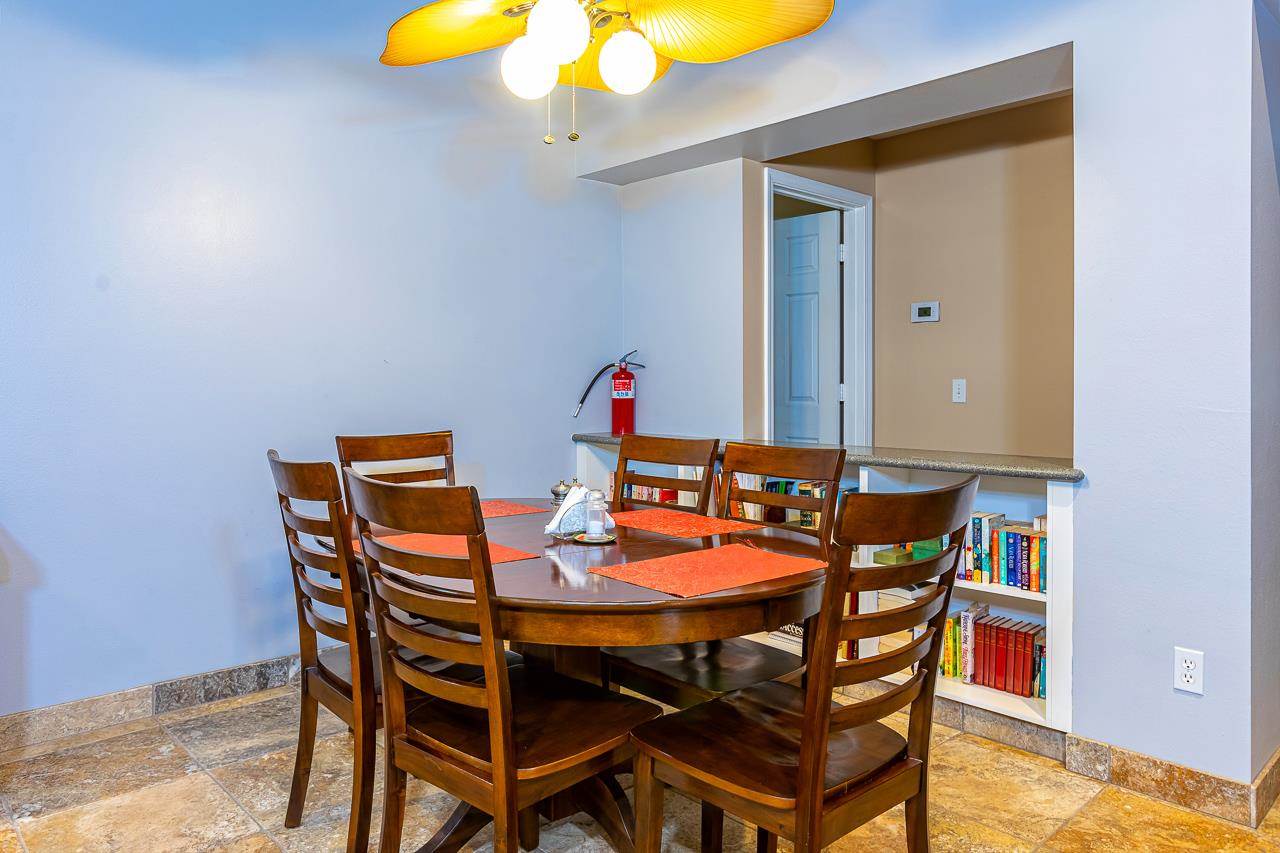 79 Molehulehu Loop Kahului, HI 96732 - Photo 12 of 29 a dining room with a table and chairs