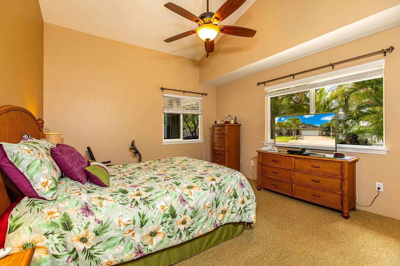 79 Molehulehu Loop Kahului, HI 96732 - Photo 14 of 29 a bedroom with a bed and a flat screen tv