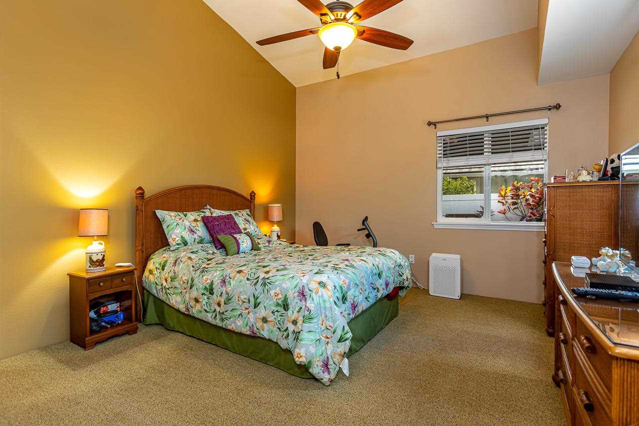 79 Molehulehu Loop Kahului, HI 96732 - Photo 15 of 29 a spacious bedroom with a bed and a window