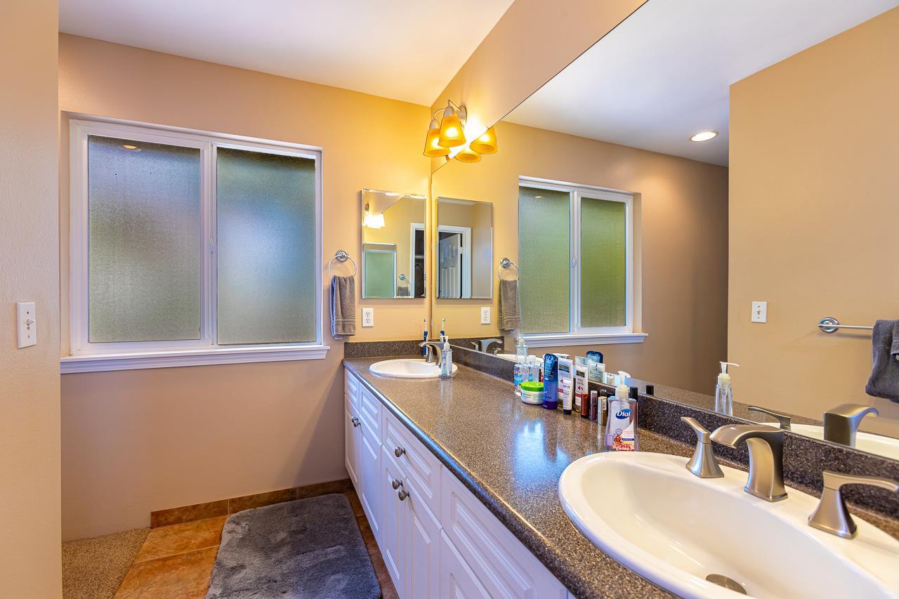 79 Molehulehu Loop Kahului, HI 96732 - Photo 20 of 29 a bathroom with a double vanity sink and a mirror