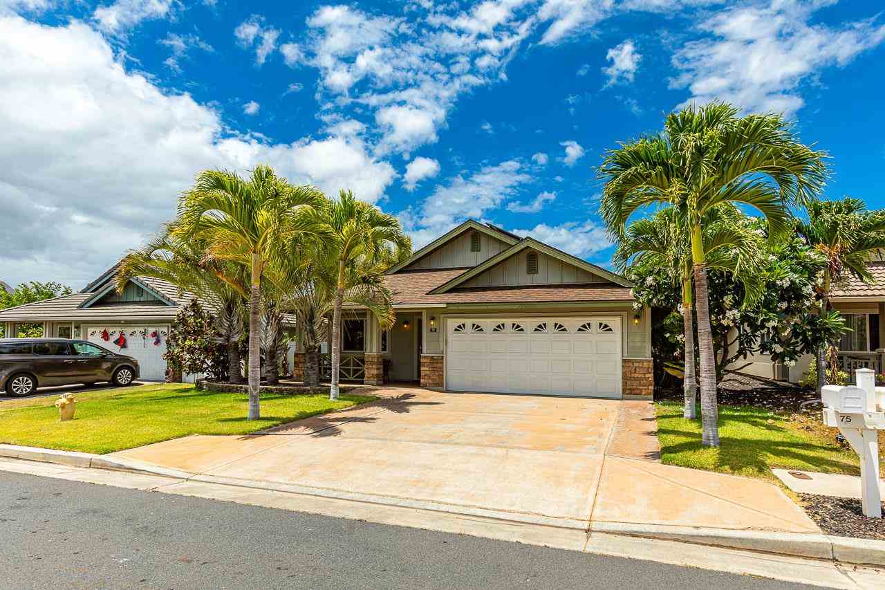 79 Molehulehu Loop Kahului, HI 96732 - Photo 2 of 29 a view of a white house with a swimming pool
