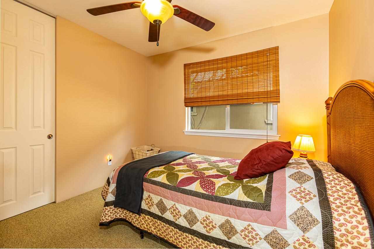79 Molehulehu Loop Kahului, HI 96732 - Photo 22 of 29 a bedroom with a bed and wooden floor