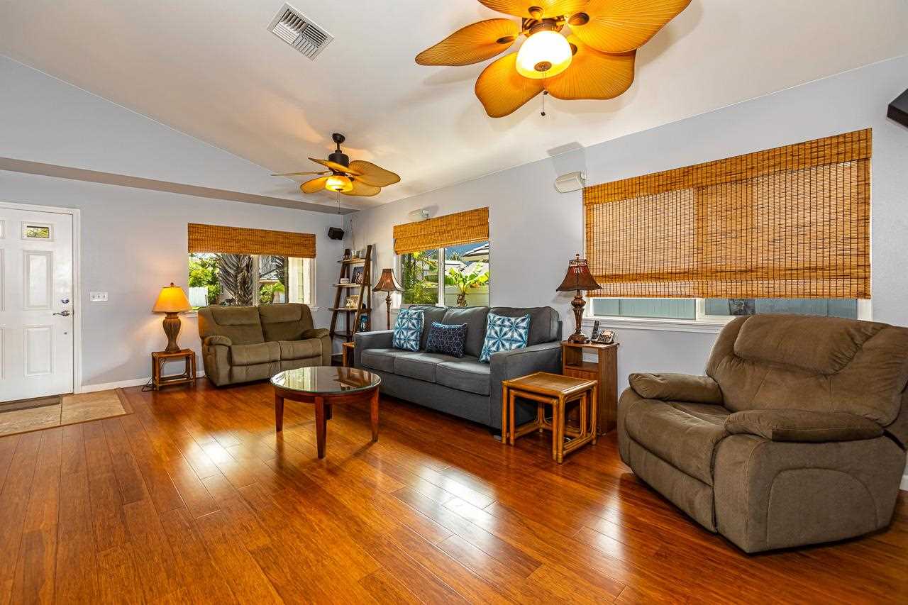 79 Molehulehu Loop Kahului, HI 96732 - Photo 7 of 29 a living room with furniture and a large window