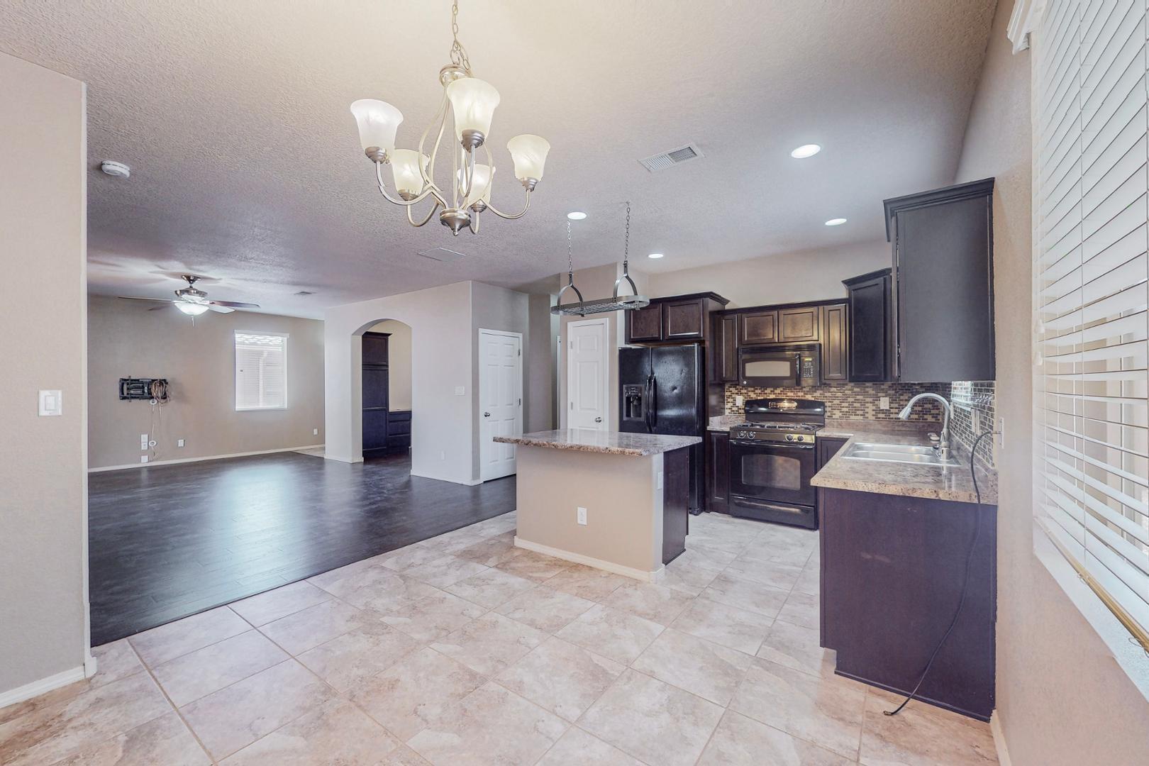 8323 Mock Heather Road Northwest Albuquerque, NM 87120 - Photo 6 of 39 Gallery Image 6