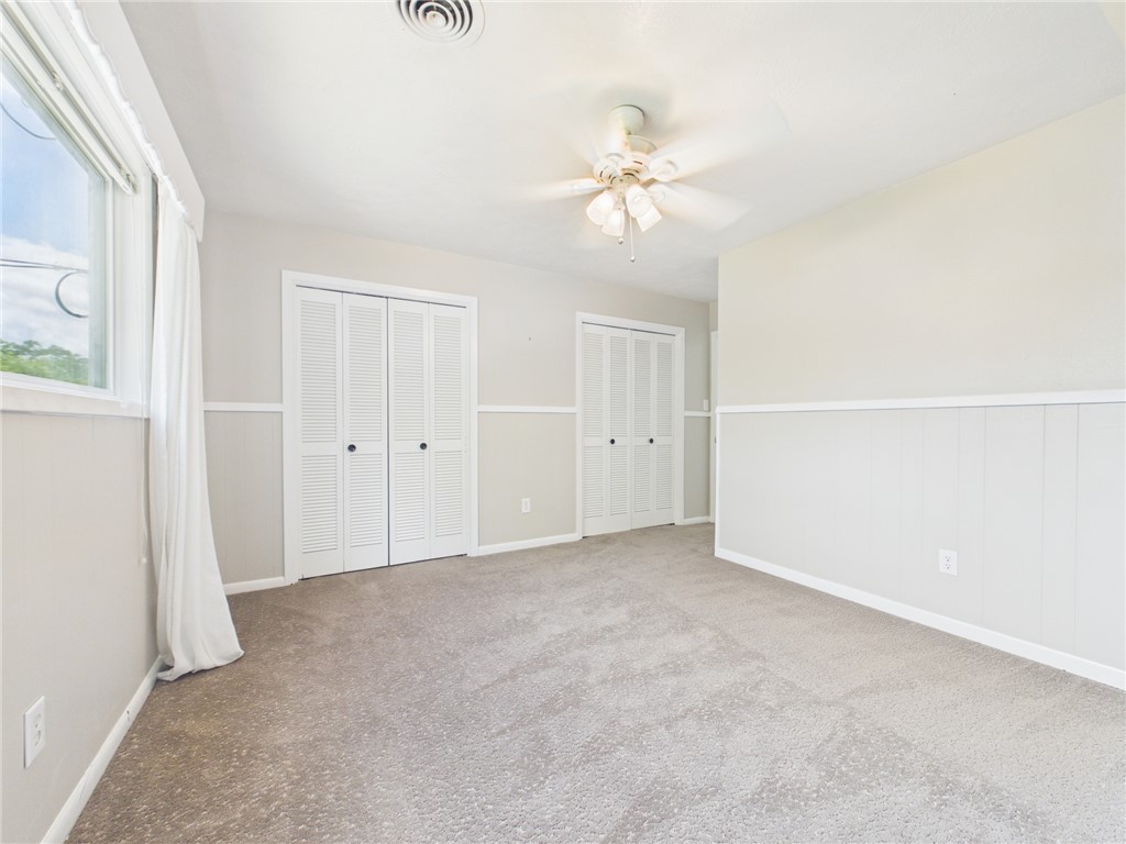 902 Briar Bend Court Bryan, TX 77802 - Photo 32 of 39 a view of an empty room with a fan