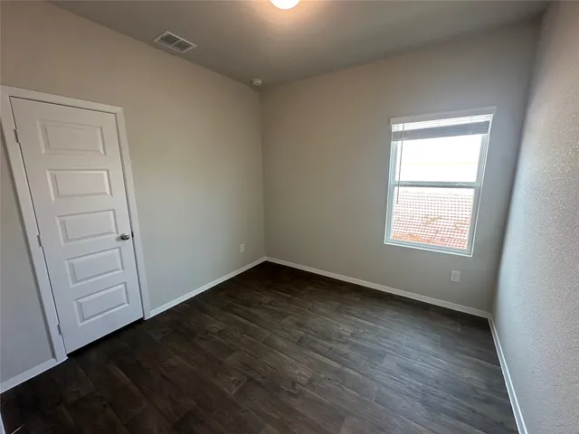 a view of a backyard with a garden