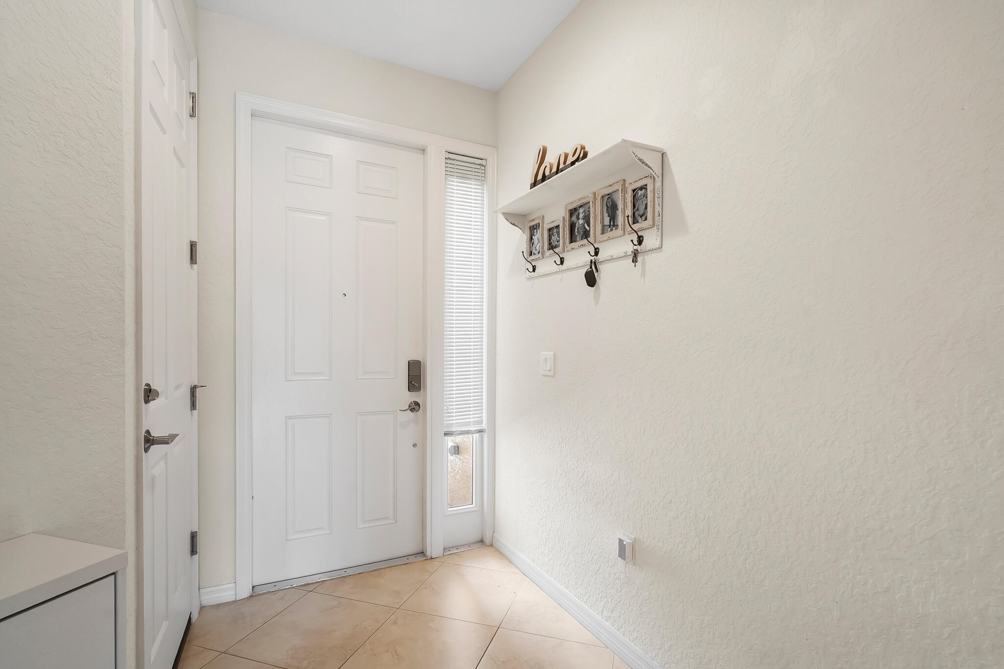 524 Southwest Glen Crest Way Stuart, FL 34997 - Photo 18 of 43 a view of a hallway with closet