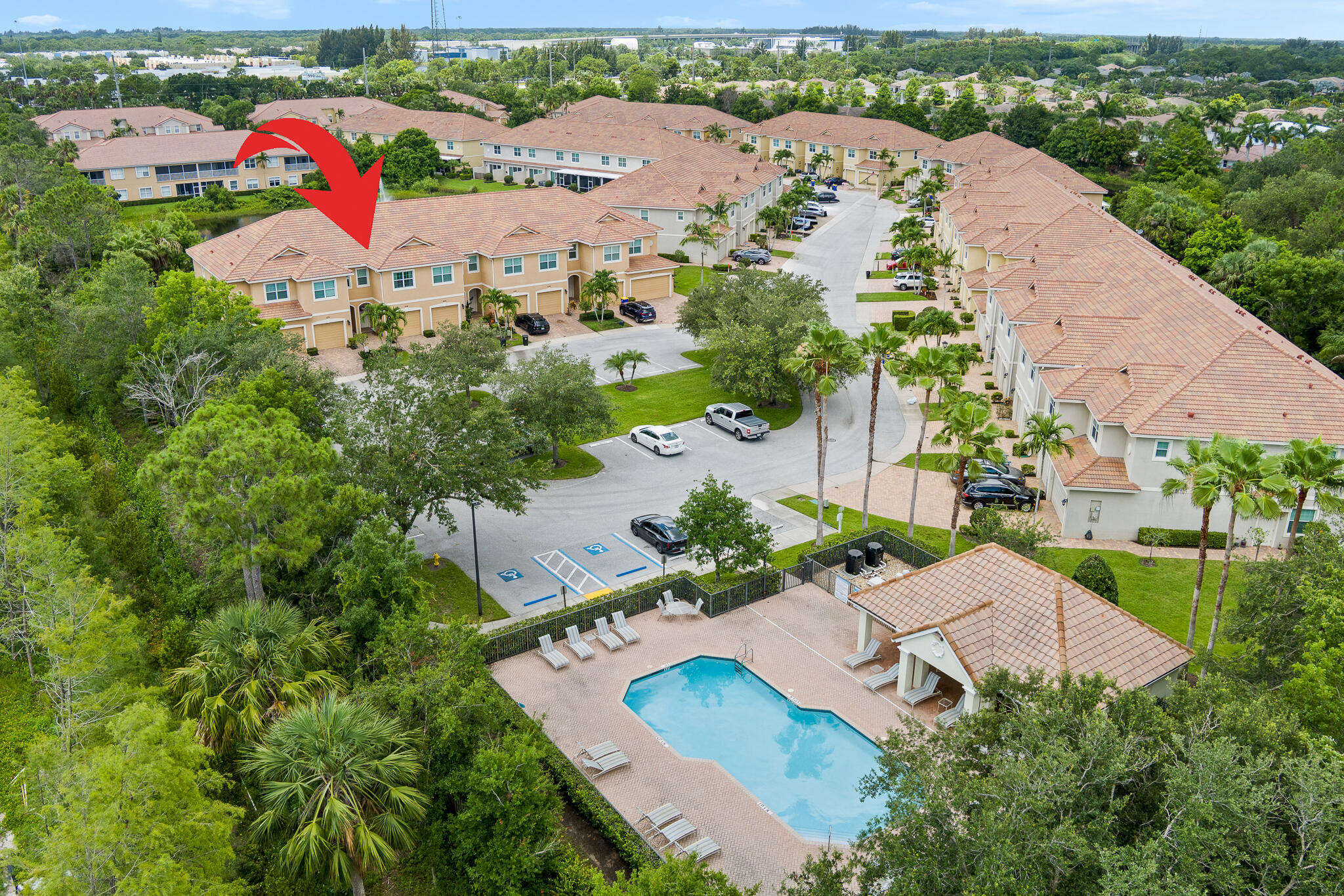 524 Southwest Glen Crest Way Stuart, FL 34997 - Photo 37 of 43 an aerial view of residential houses with outdoor space and parking