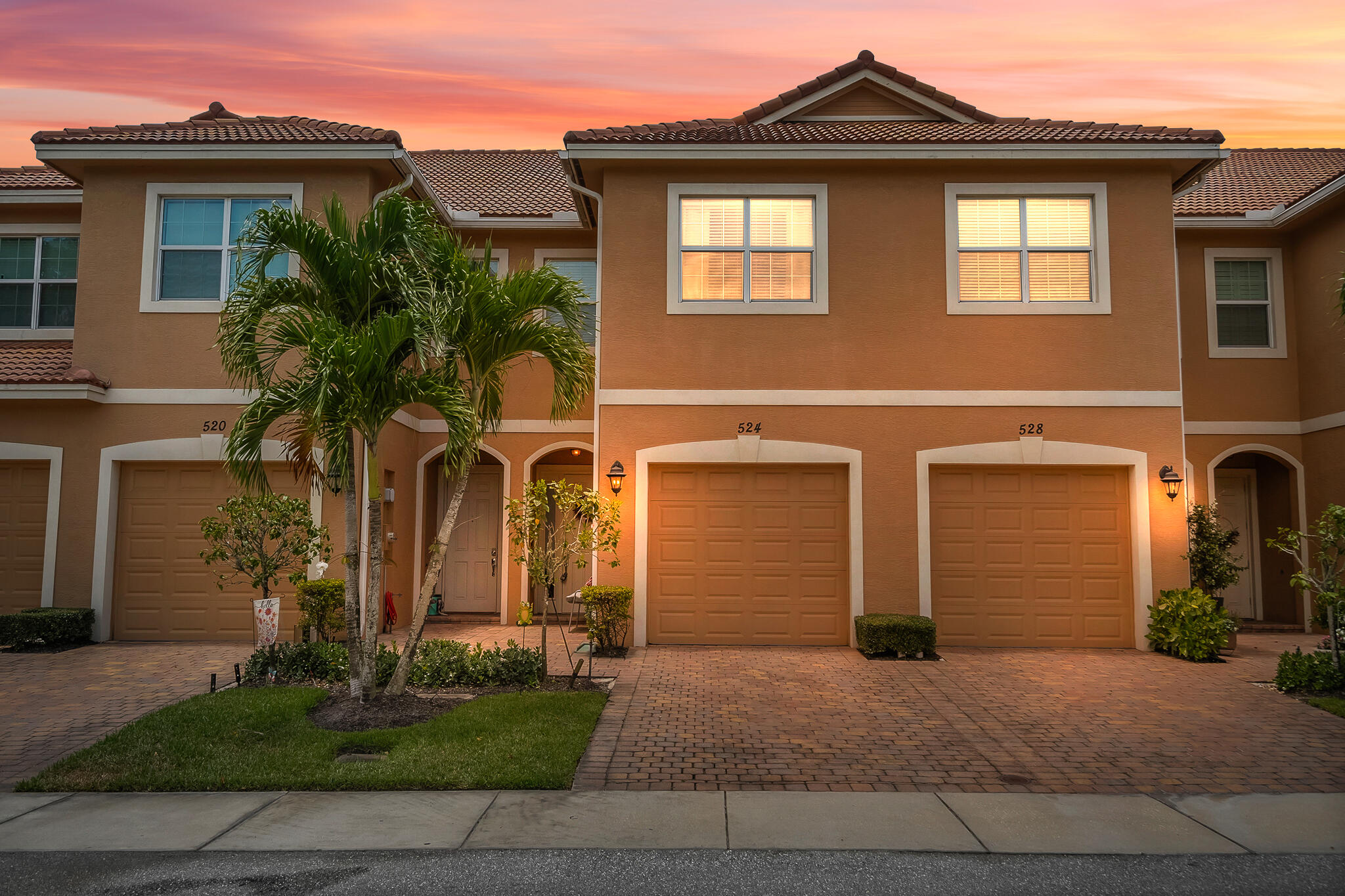 524 Southwest Glen Crest Way Stuart, FL 34997 - Photo 38 of 43 a front view of a house with garden