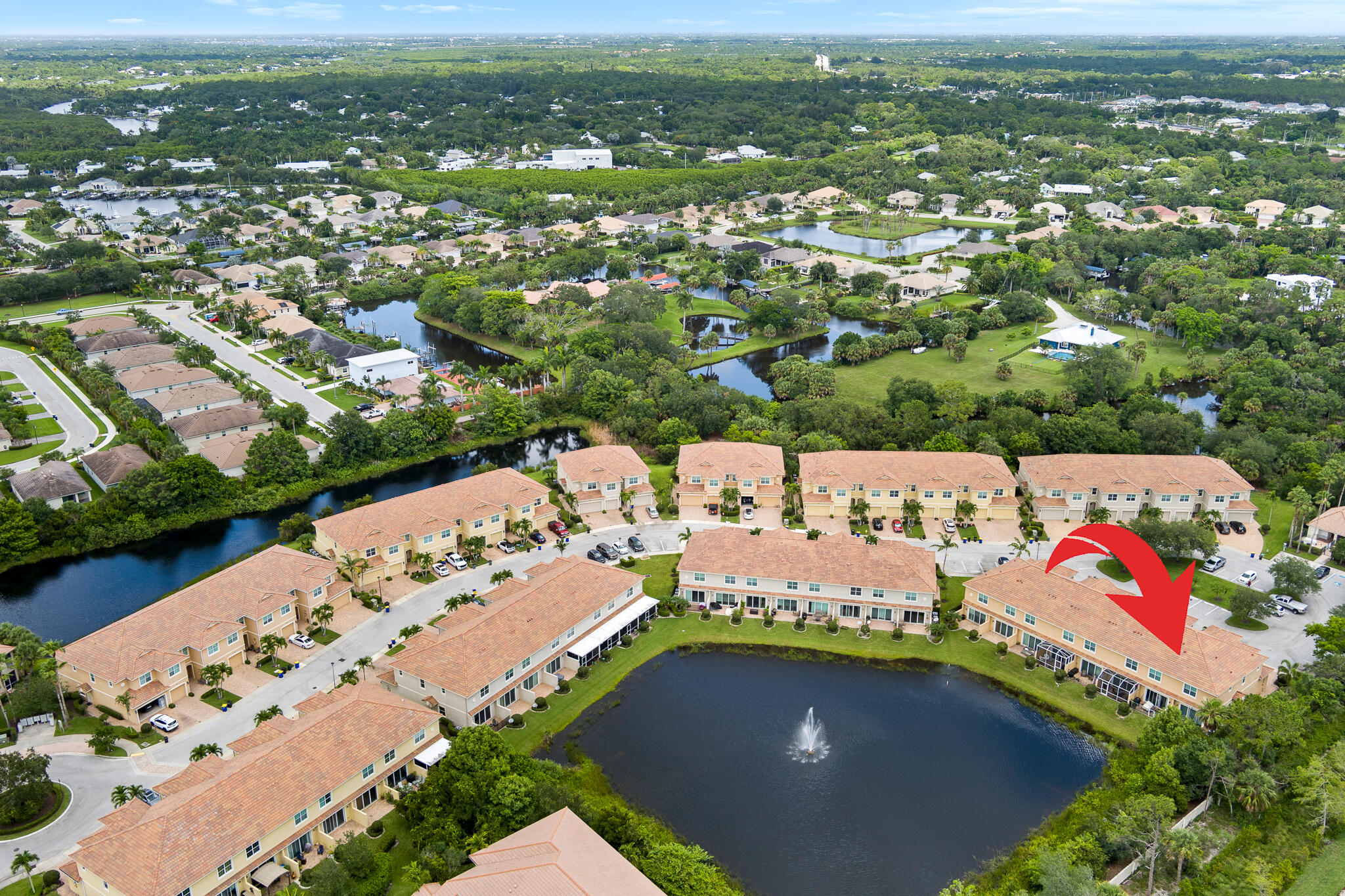 524 Southwest Glen Crest Way Stuart, FL 34997 - Photo 40 of 43 an aerial view of a city with lots of residential buildings