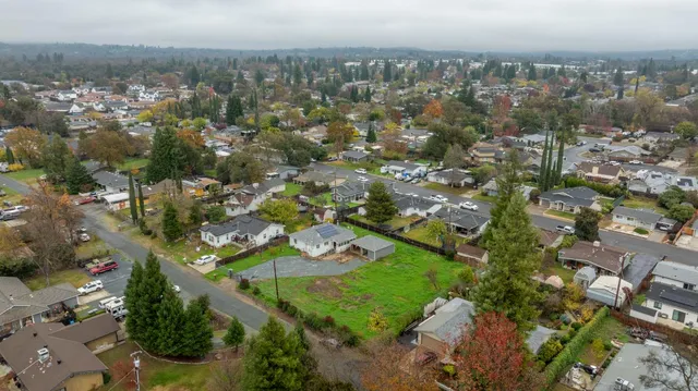 an aerial view of a city with lots of residential buildings