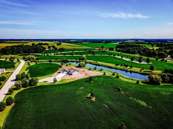 a view of a golf course with a lake