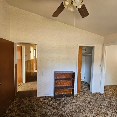a view of a livingroom with a staircase